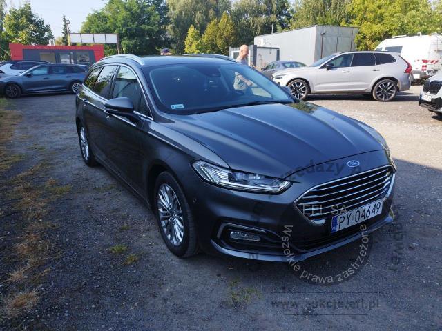 6 - Ford Mondeo 2.0 Hybrid Titanium 2022r. PY04649 UWAGA!! Pojazd znajduje się w firmie Arctos Sp. z o.o. Warszawa, Al. Krakowska 7, 02-183 Warszawa