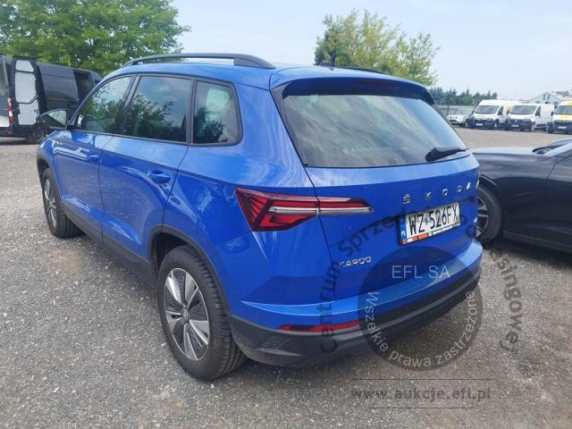 11 - Skoda Karoq 2.0 TDI SCR 4x4 Ambition DSG 2023r. WZ526FX Pojazd znajduje się w firmie ARCTOS GROUP sp. z o.o. Al. Krakowska 7, 02-183 Warszawa